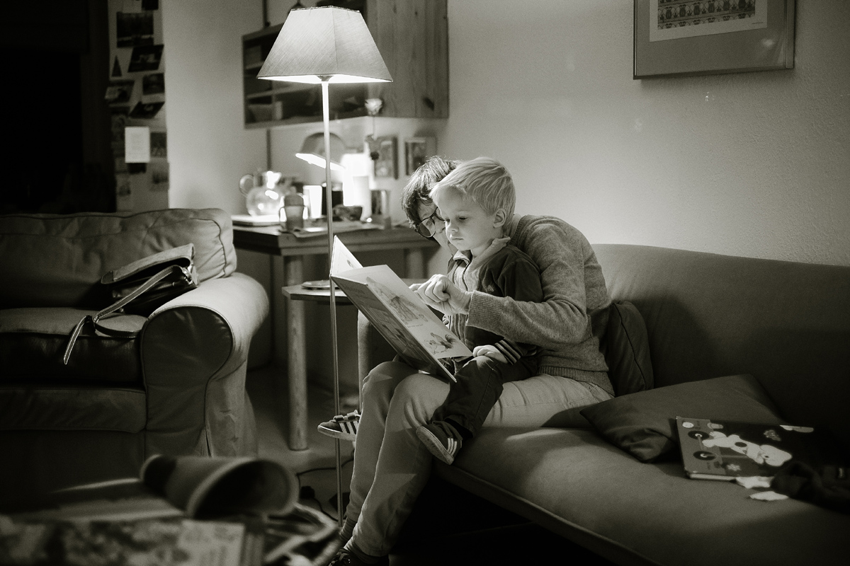 woman reading to child